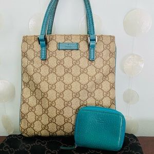 Authentic Gucci handbag with matching coin purse.